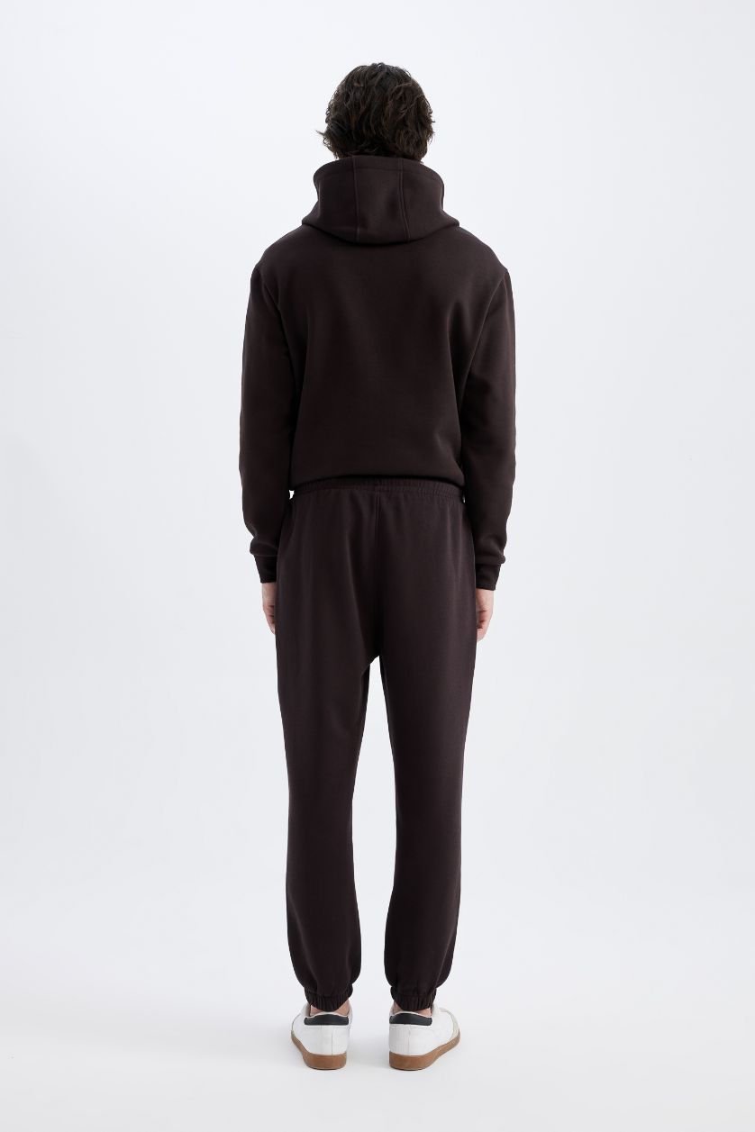 Man Brown Regular Fit Zipper Pocket Printed Trousers