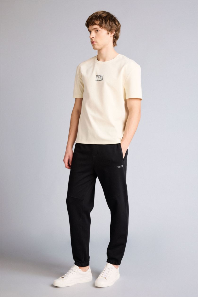 Man Black Regular Fit Zipper Pocket Printed Trousers