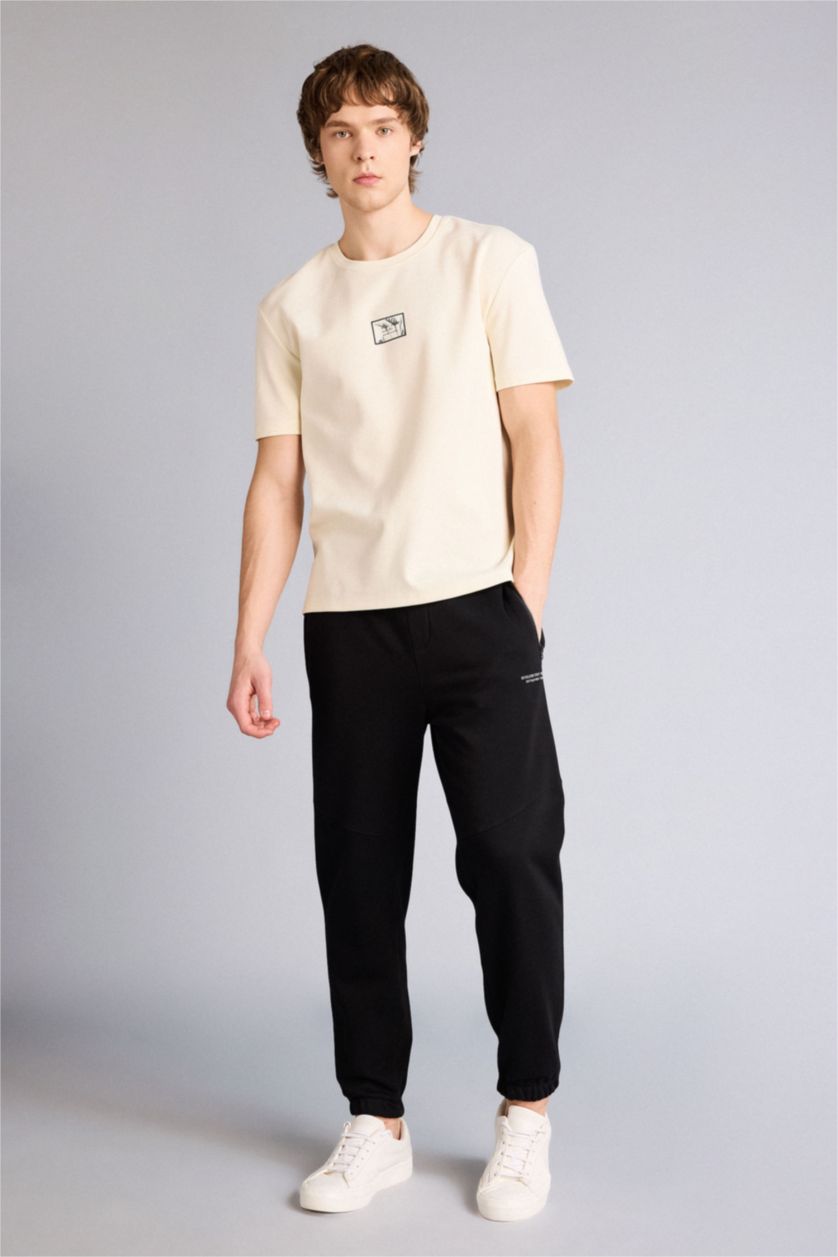 Man Black Regular Fit Zipper Pocket Printed Trousers