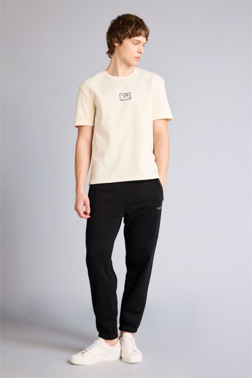 Man Black Regular Fit Zipper Pocket Printed Trousers