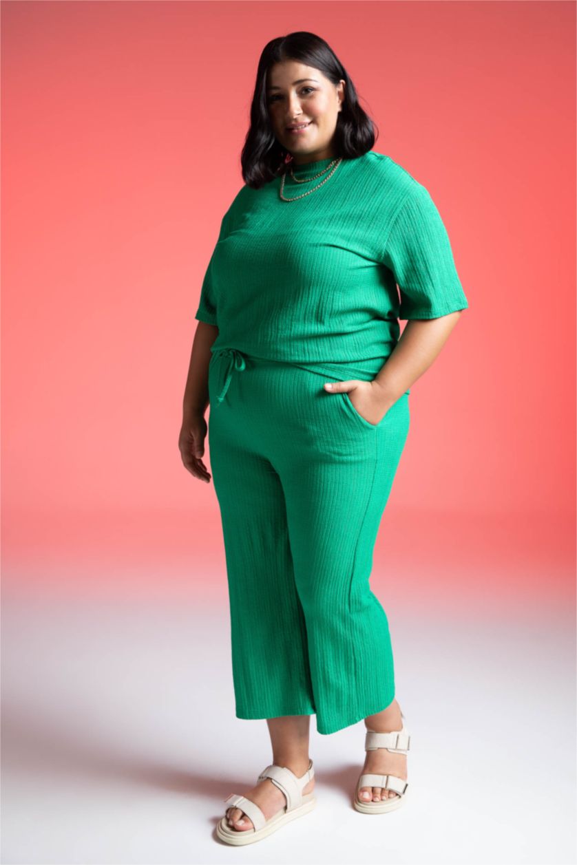 FEMME Vert Pantalon de survêtement à poche capri DF Plus