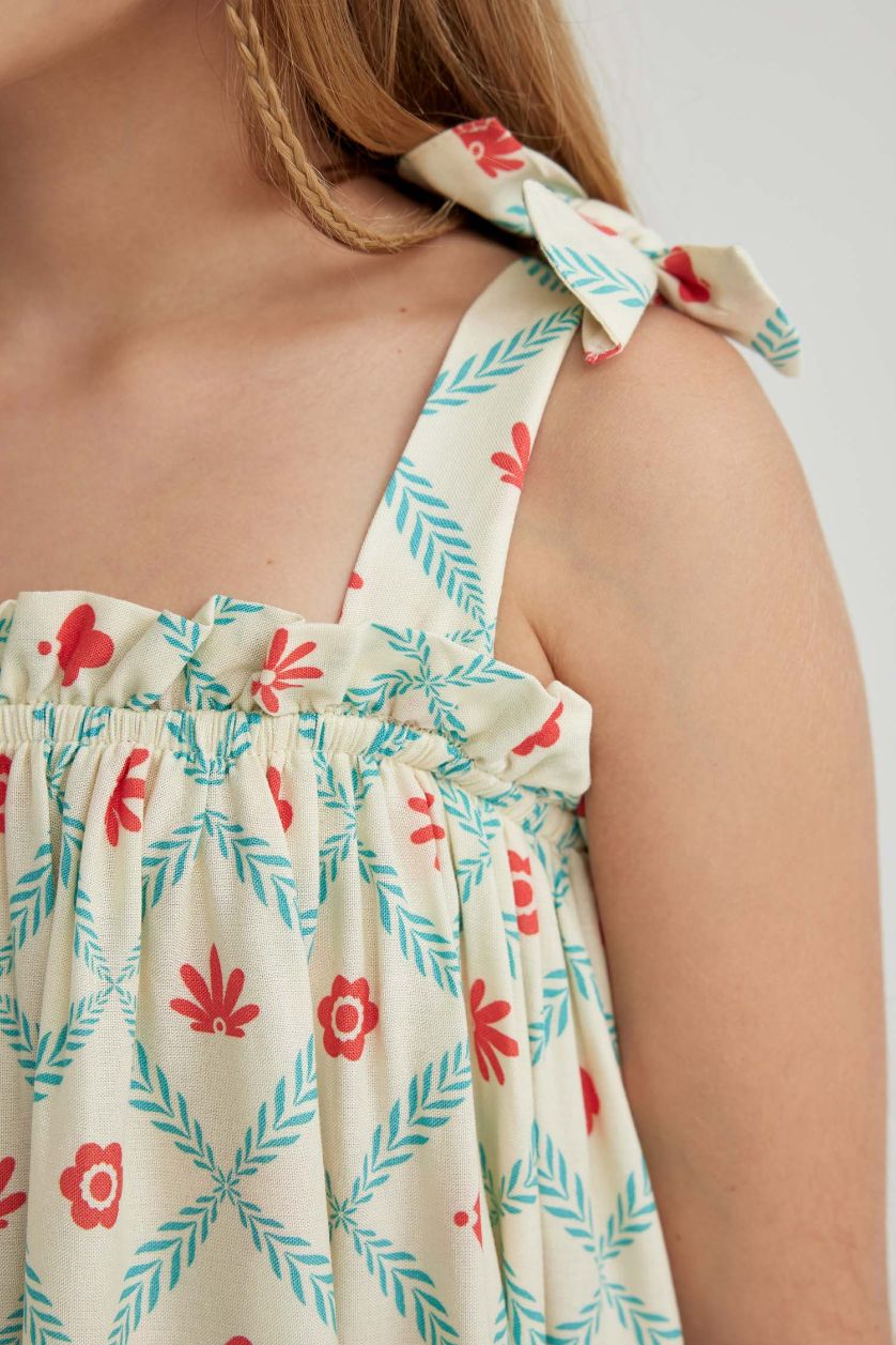 بناتي بيج فاتح فستان بناتي منقوش بحمالات