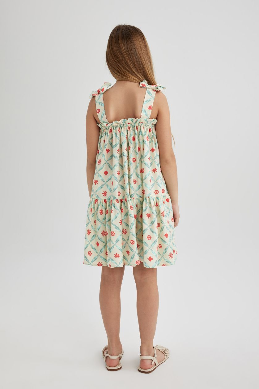 بناتي بيج فاتح فستان بناتي منقوش بحمالات