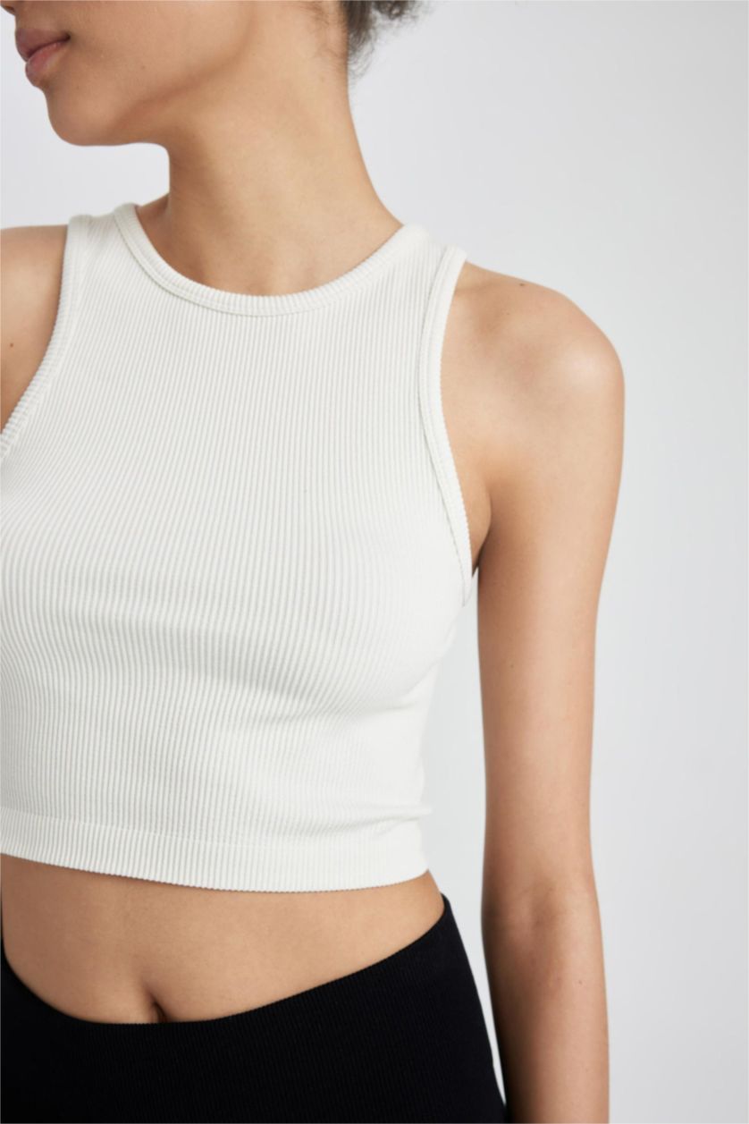 نساء اللون الحجري أندر شيرت بدون خياطة بدون أكمام من DeFactoFit