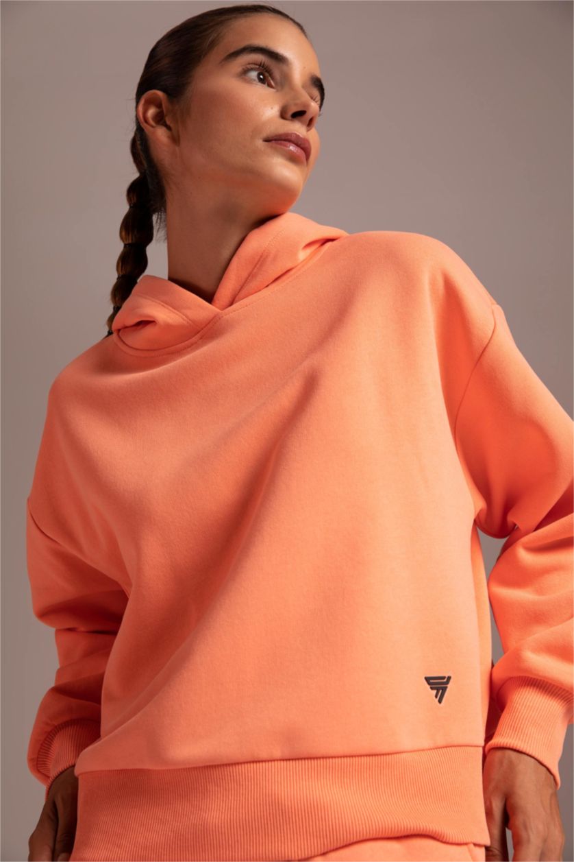 حريمي مرجاني سويت شيرت بكابيشون من DeFactoFit