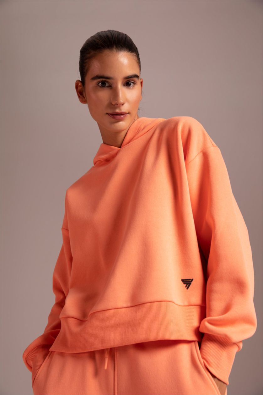 حريمي مرجاني سويت شيرت بكابيشون من DeFactoFit