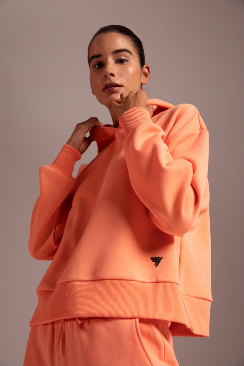 حريمي مرجاني سويت شيرت بكابيشون من DeFactoFit