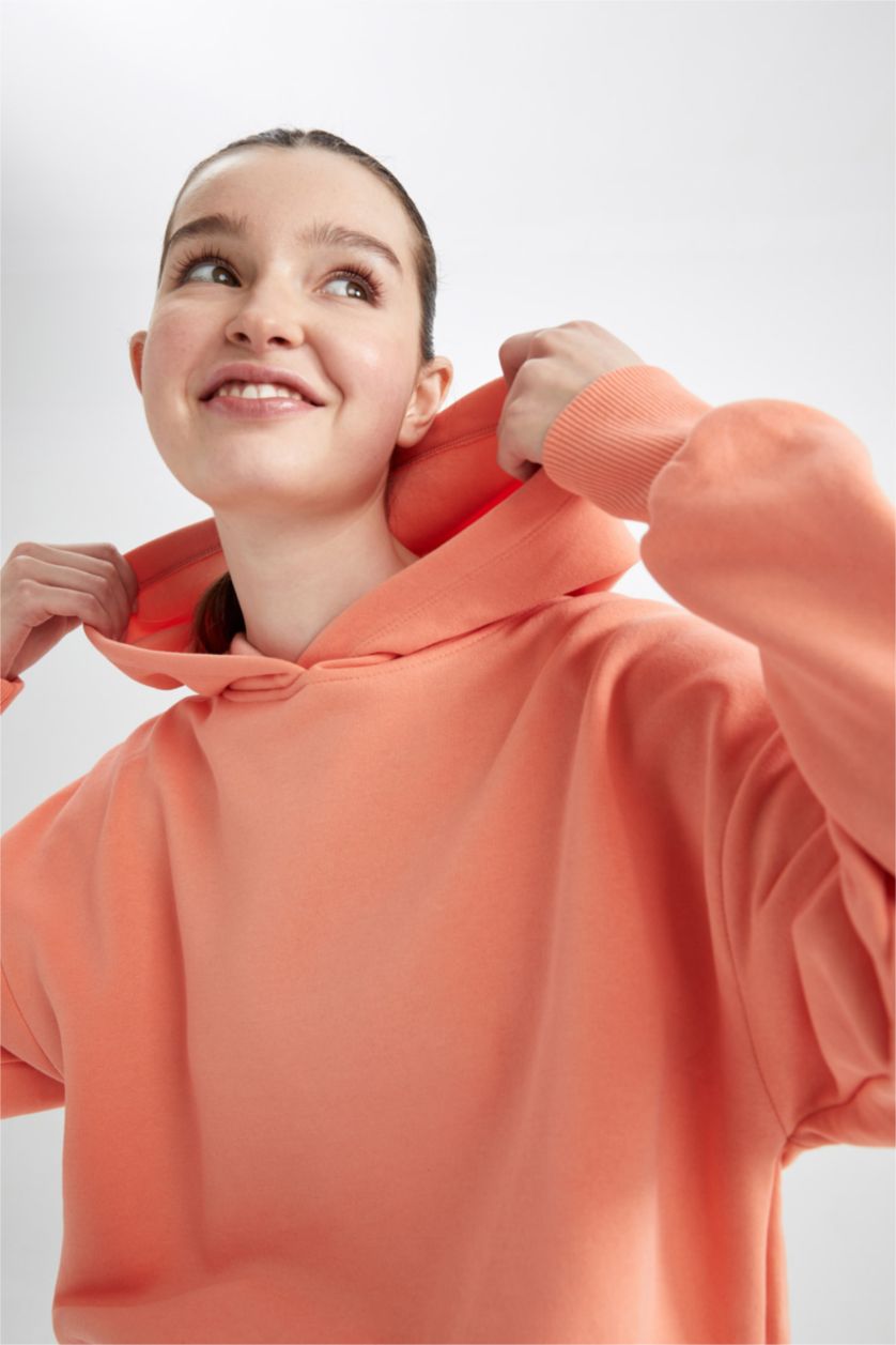 حريمي مرجاني سويت شيرت بكابيشون من DeFactoFit