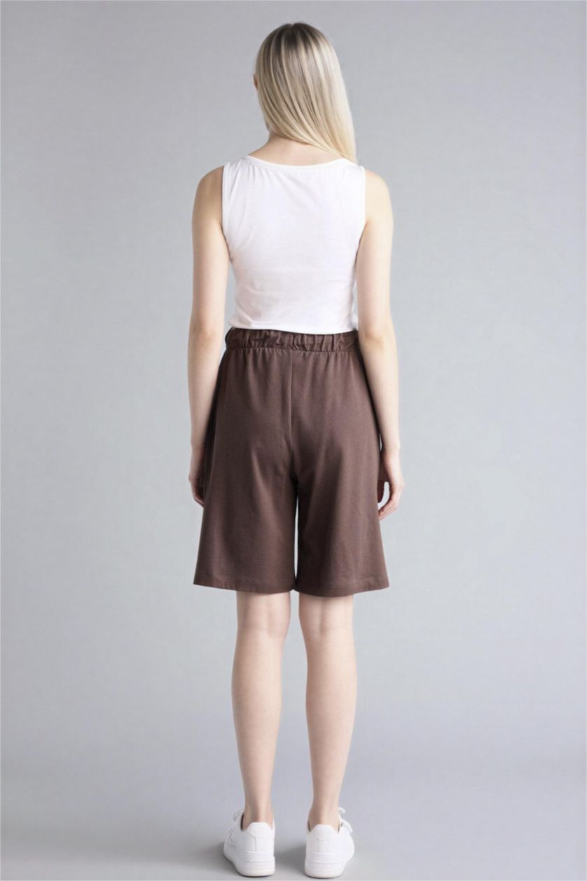 Әйелдерге ашық қоңыр негізгі Бермуда