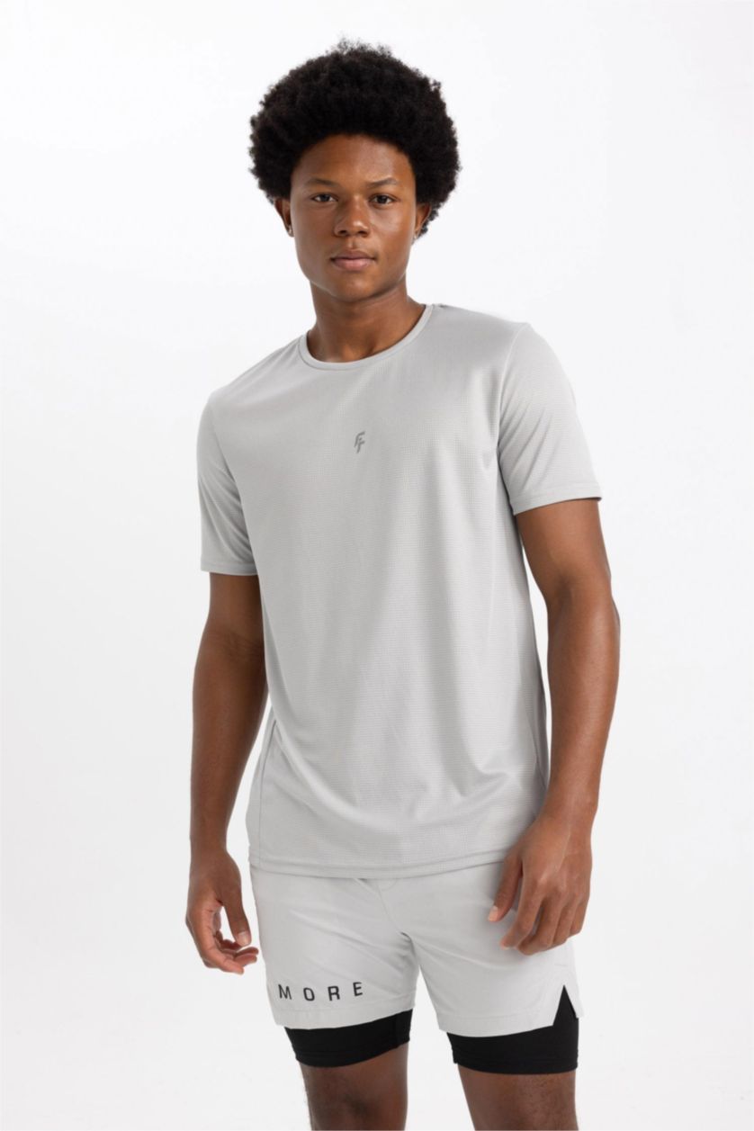 رجالي رمادي فاتح شورت رياضي سليم فيت من DeFactofit