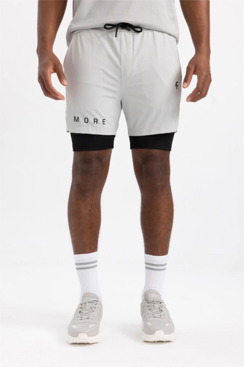 رجالي رمادي فاتح شورت رياضي سليم فيت من DeFactofit