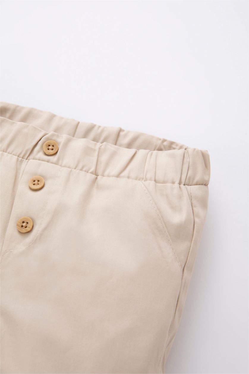 طفل صغير بيج شورت بيزك بقصة عادية وخصر مرن