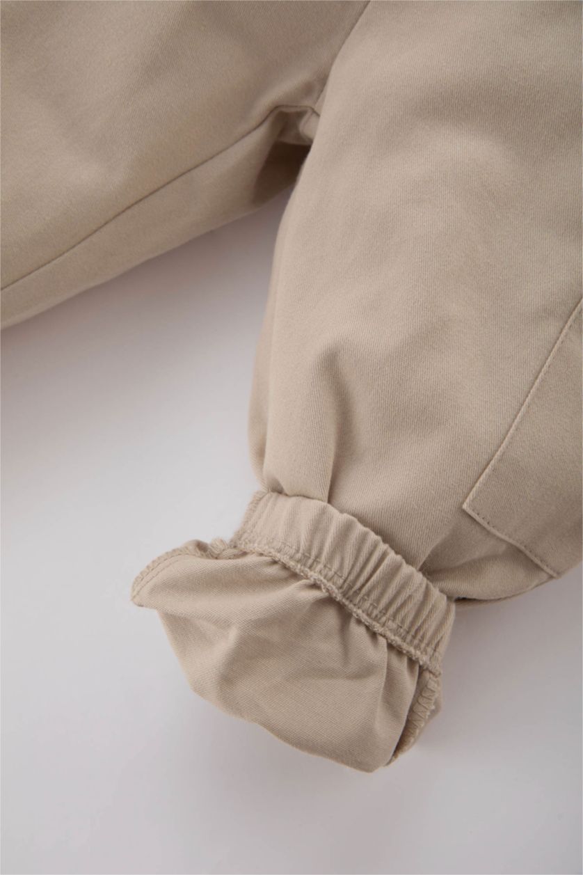 طفل صغير بيج بنطلون كارجو بيبي اولادي جبردين قصة عادية بجيب