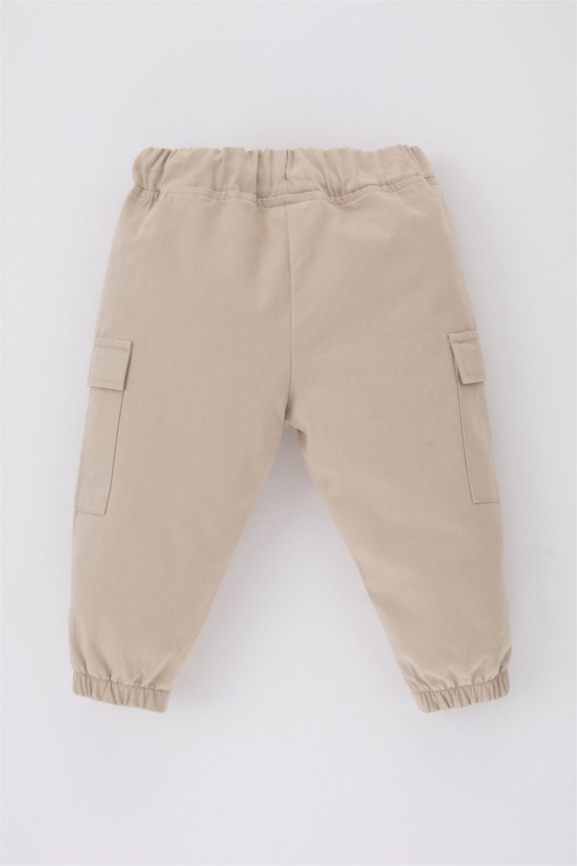 طفل صغير بيج بنطلون كارجو بيبي اولادي جبردين قصة عادية بجيب