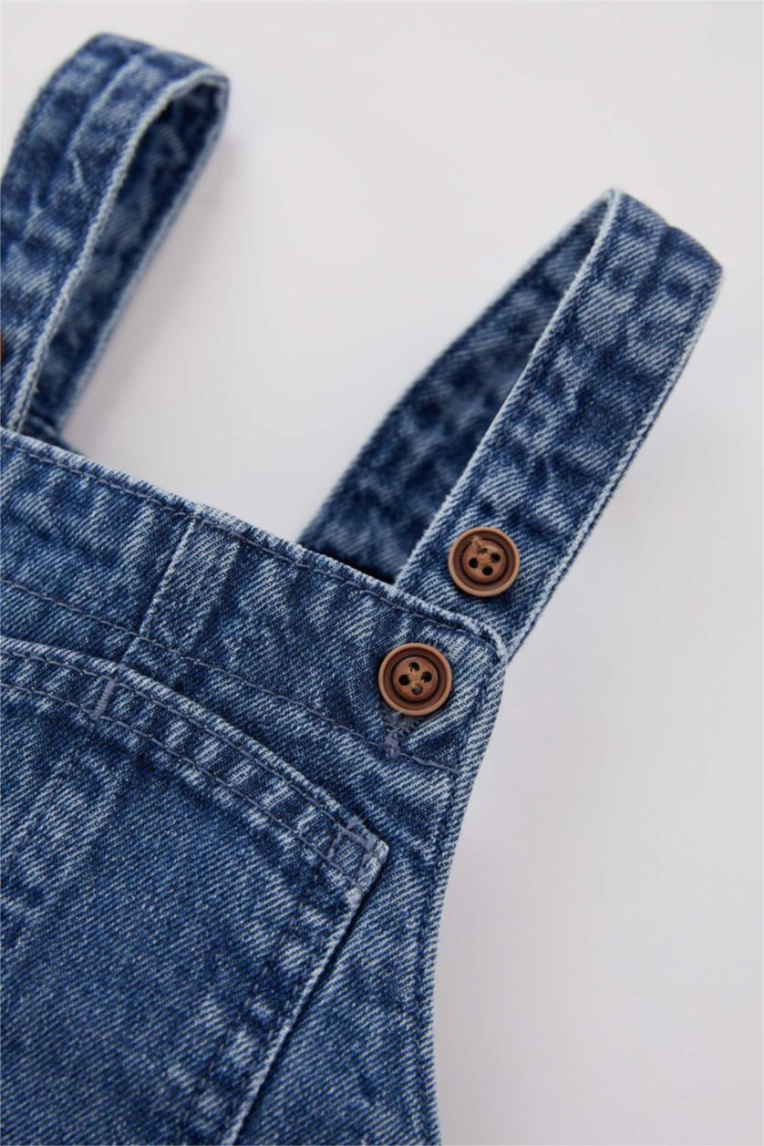 طفل صغير أزرق جمبسوت ولادي