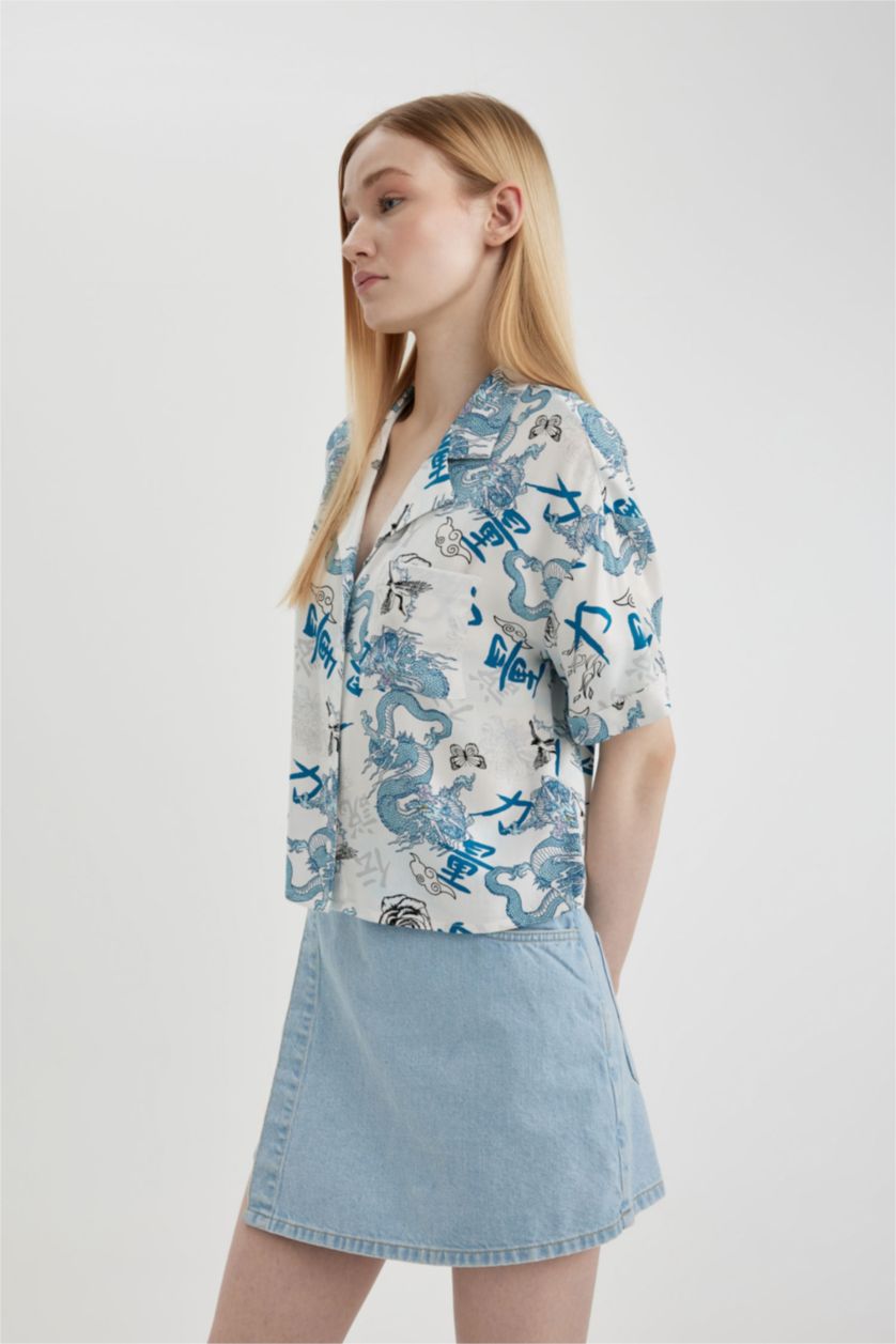 FEMME Blanc Chemise à manches courtess coupe régulière à motifs