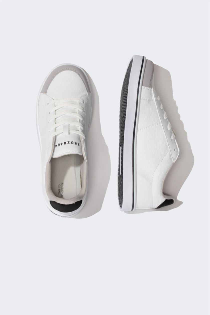 حريمي أبيض (000) سنيكرز حريمي جلد صناعي برباط