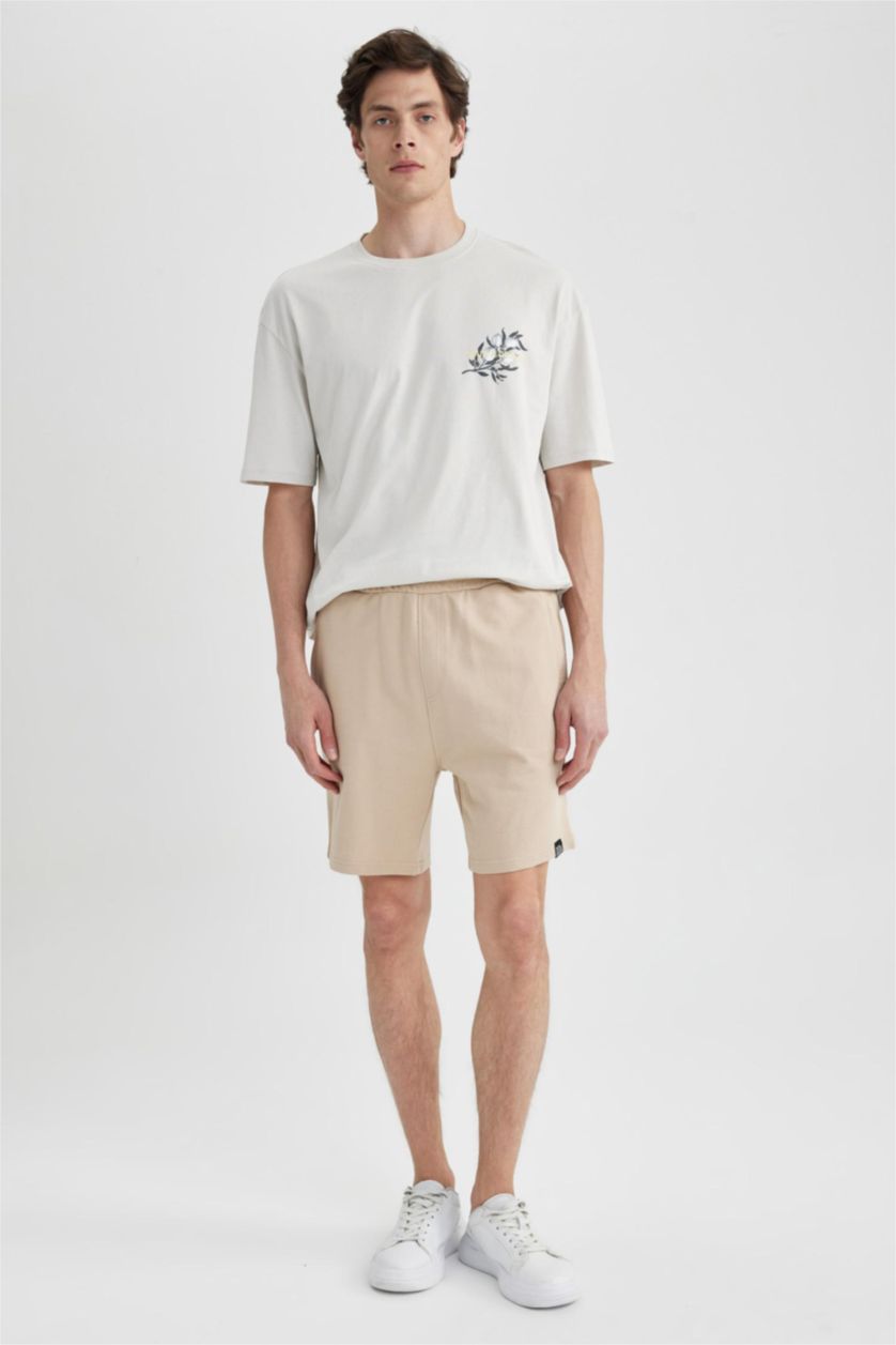 HOMME Beige Short en coton à coupe régulière