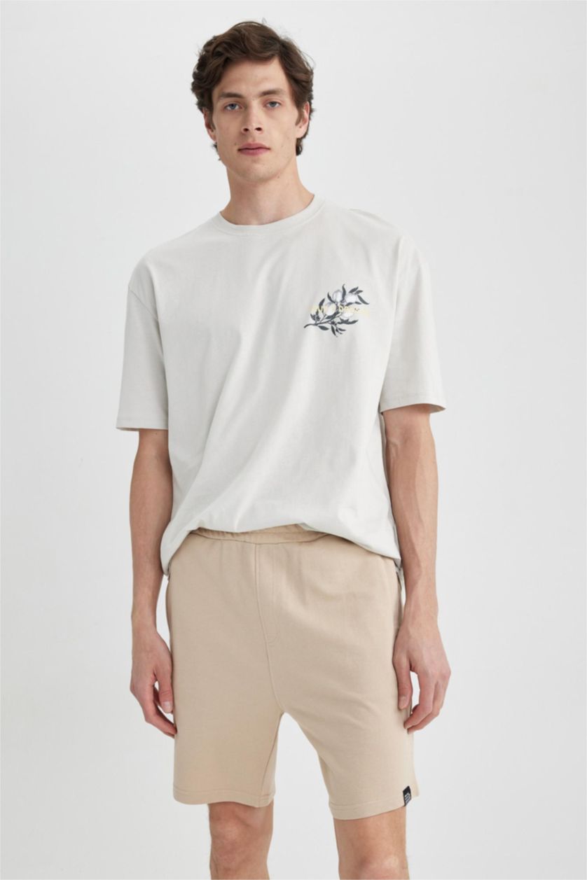 HOMME Beige Short en coton à coupe régulière
