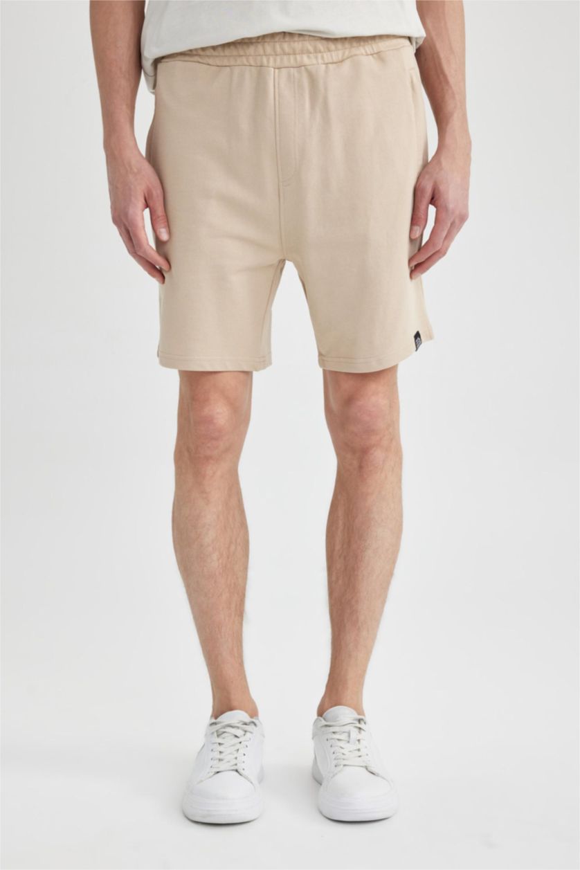 HOMME Beige Short en coton à coupe régulière