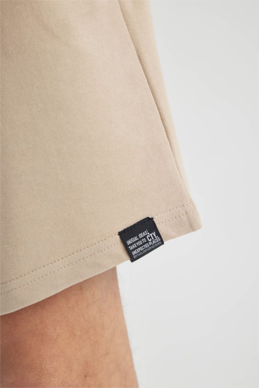 HOMME Beige Short en coton à coupe régulière