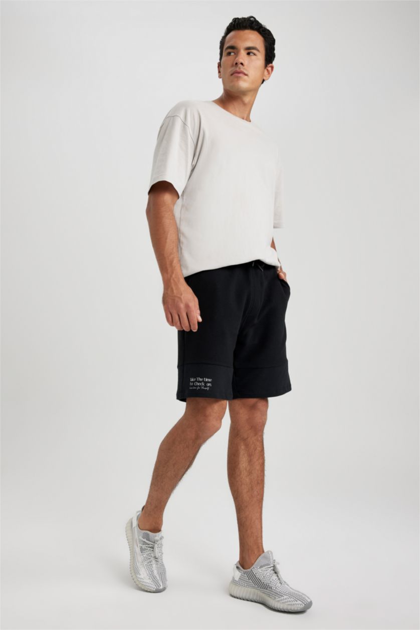 رجال أسود شورت كابري سليم فيت