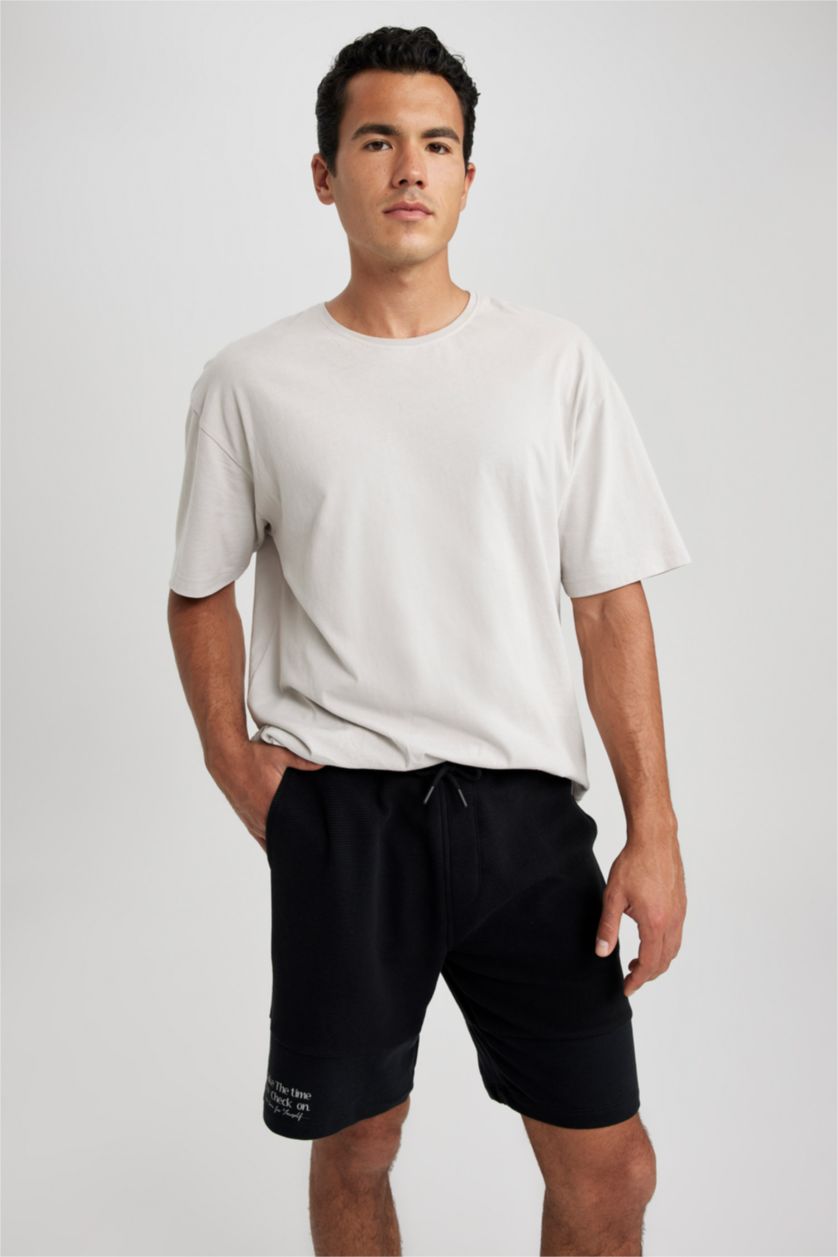 رجال أسود شورت كابري سليم فيت