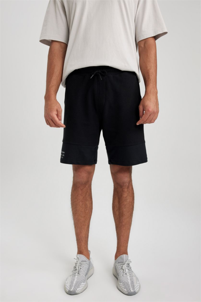 رجال أسود شورت كابري سليم فيت