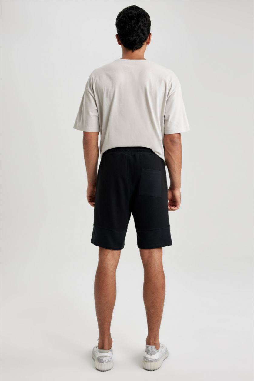 رجال أسود شورت كابري سليم فيت