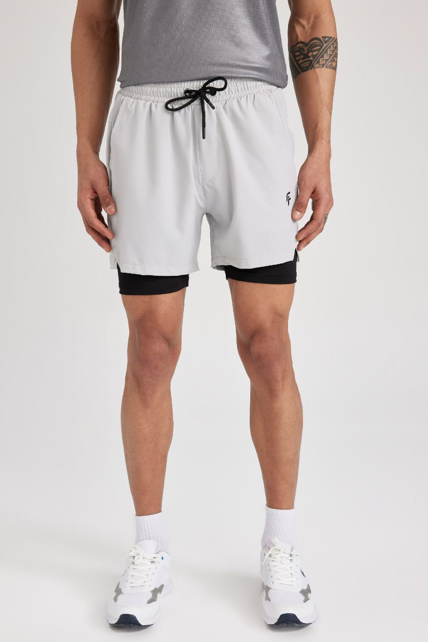 رجالي رمادي فاتح شورت مع ليجن سليم فيت من DeFactoFit