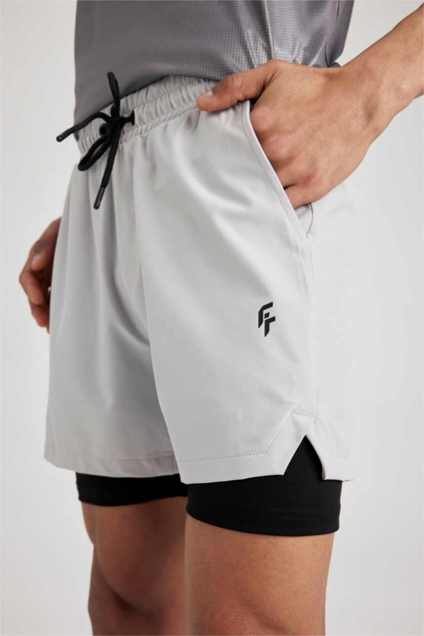 رجالي رمادي فاتح شورت مع ليجن سليم فيت من DeFactoFit