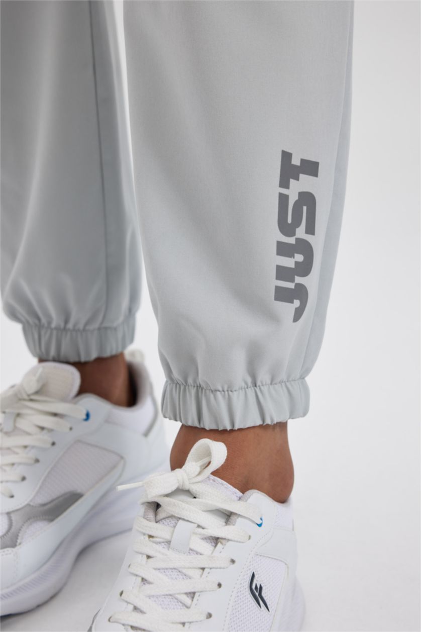 Man Light Grey DeFactoFit Slim Fit Double Pocket Woven Sweatpants