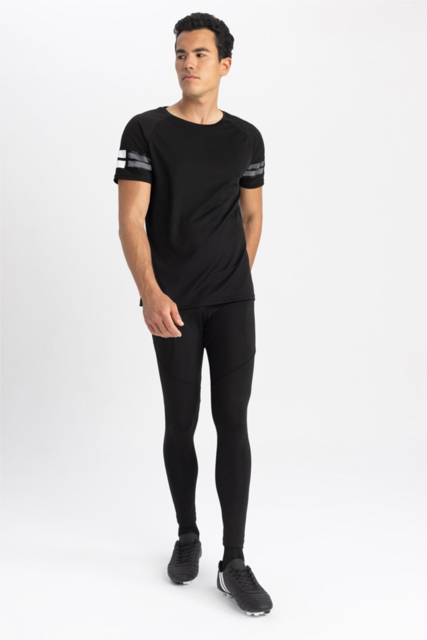 رجال أسود ستريج رياضي سليم فيت