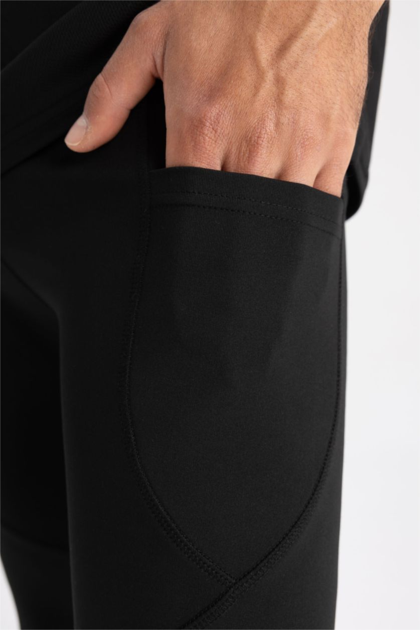 رجال أسود ستريج رياضي سليم فيت