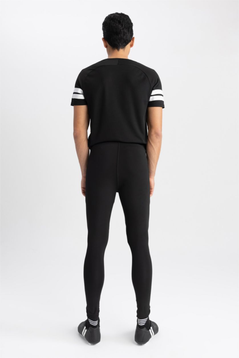 رجال أسود ستريج رياضي سليم فيت