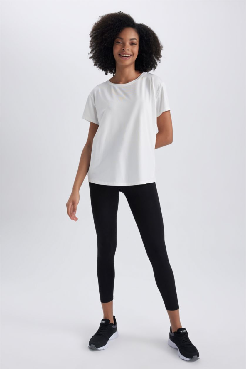 حريمي بيج فاتح تيشيرت رياضي قصة مريحة برقبة مستديرة