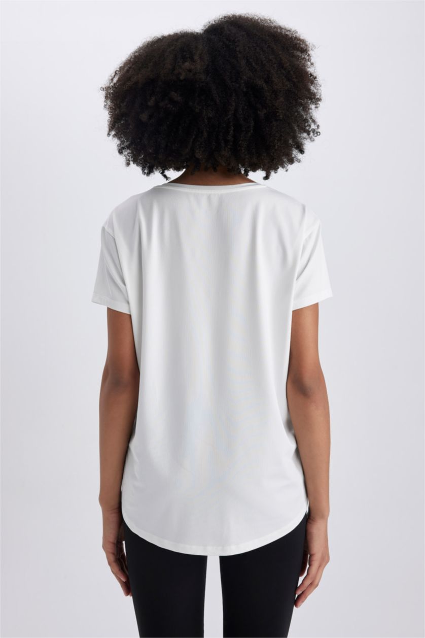 حريمي بيج فاتح تيشيرت رياضي قصة مريحة برقبة مستديرة