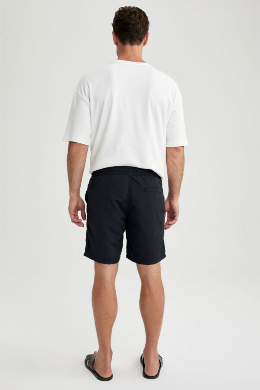 MAN Black Regular Fit Short Swim Shorts
