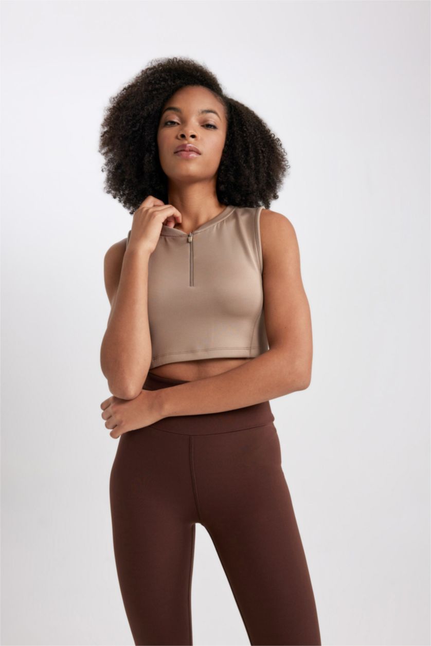 نساء فيزوني ديباردور قصير توب برقبة رسن من DeFactoFit