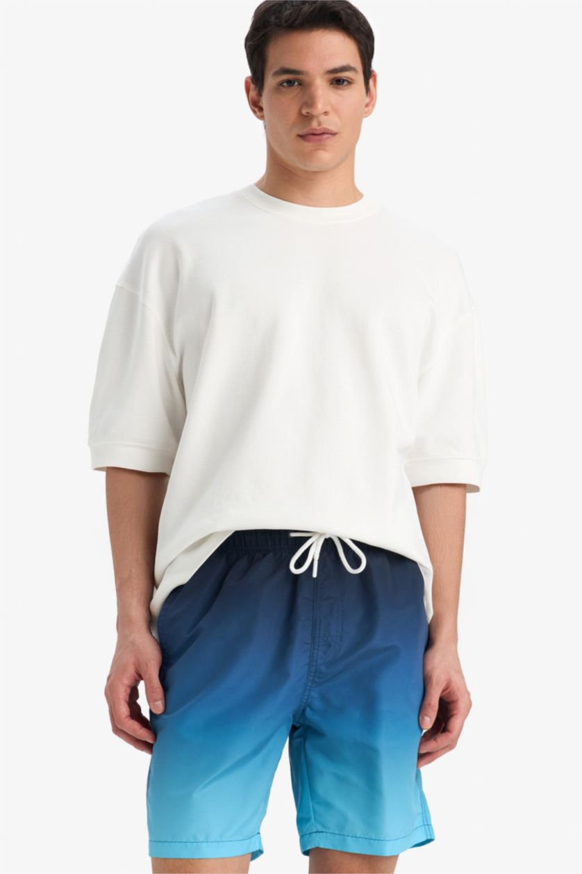 MAN NAVY Regular Fit Gradient Printed Mesh Lined Swim Shorts