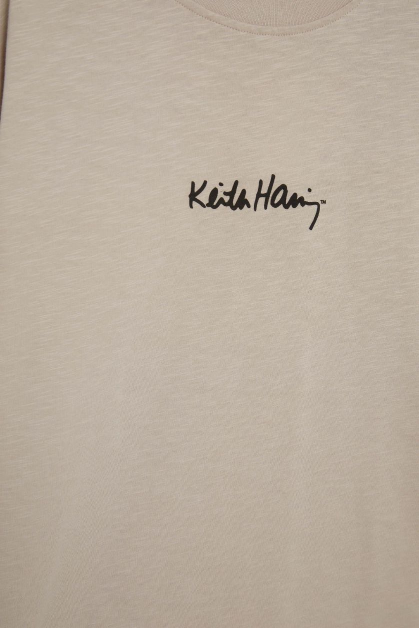 Erkek Kum %100 Pamuk Keith Haring Comfort Regular Fit Rahat Kalıp Bisiklet Yaka Sırt Baskılı Kısa Kollu Tişört