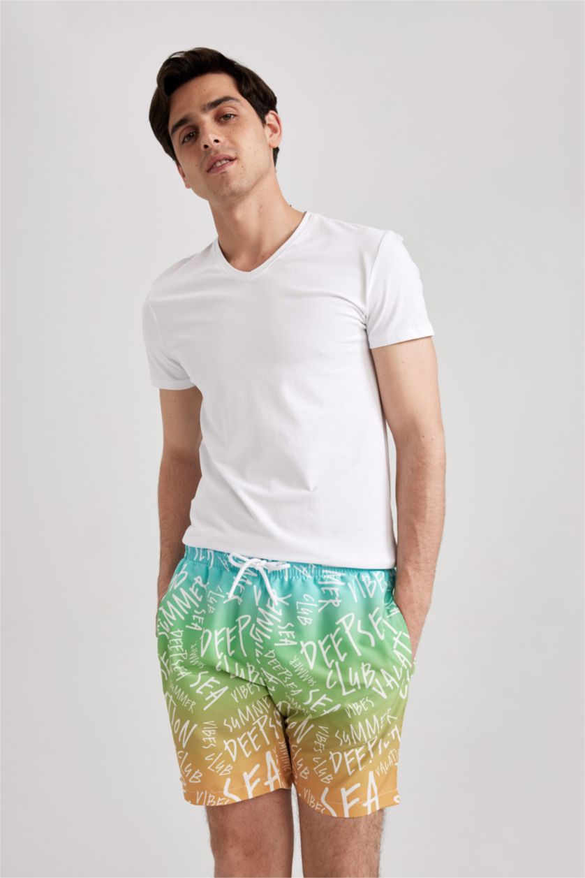 HOMME Bleu Short de Bain coupe régulière imprimé