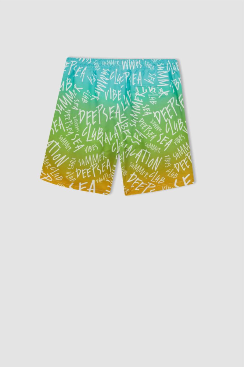 HOMME Bleu Short de Bain coupe régulière imprimé