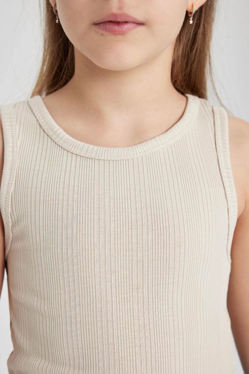 بنات اللون الحجري فانيلة بناتي سادة سليم فيت بدون ردن بياخة مستديرة