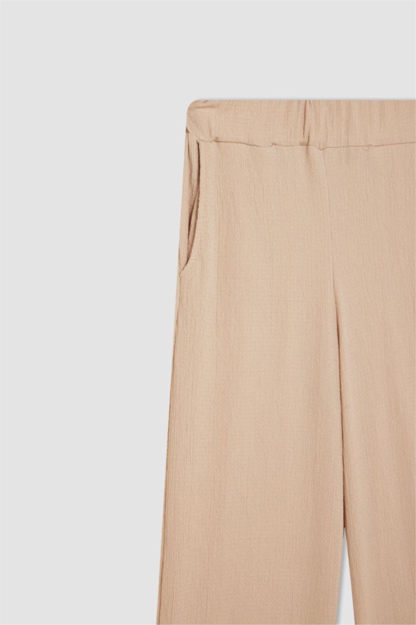 Kadın Açık Bej 	Relax Fit Beli Lastikli Basic Düz Bürümcük Pantolon