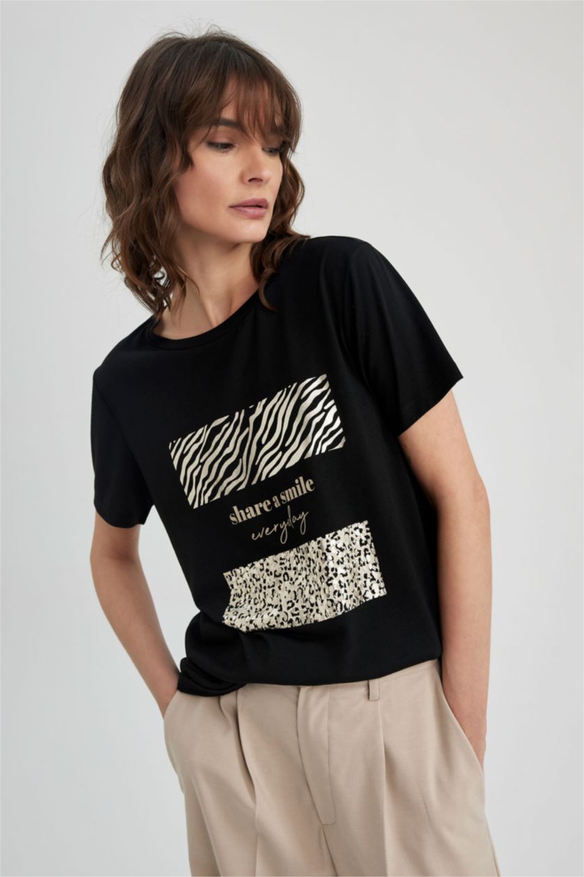 نساء أسود تي شيرت بطباعة الحيوانات قصة مريحة بياقة مستديرة