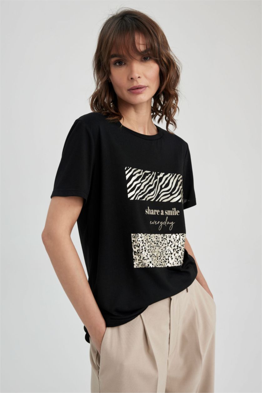 نساء أسود تي شيرت بطباعة الحيوانات قصة مريحة بياقة مستديرة