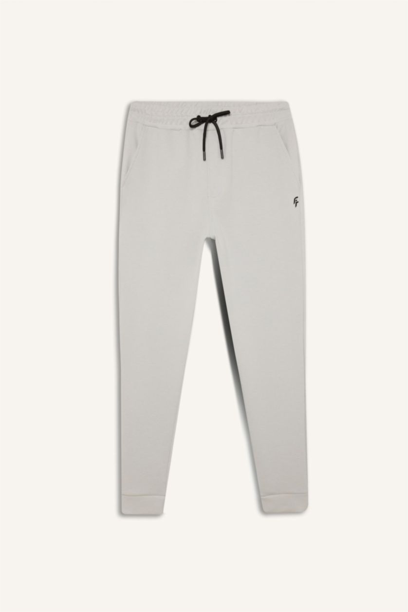 رجال رمادي فاتح بنطلون بجامة رياضي قماش سكوبا سليم فيت برجل مطاطي من DeFactoFit