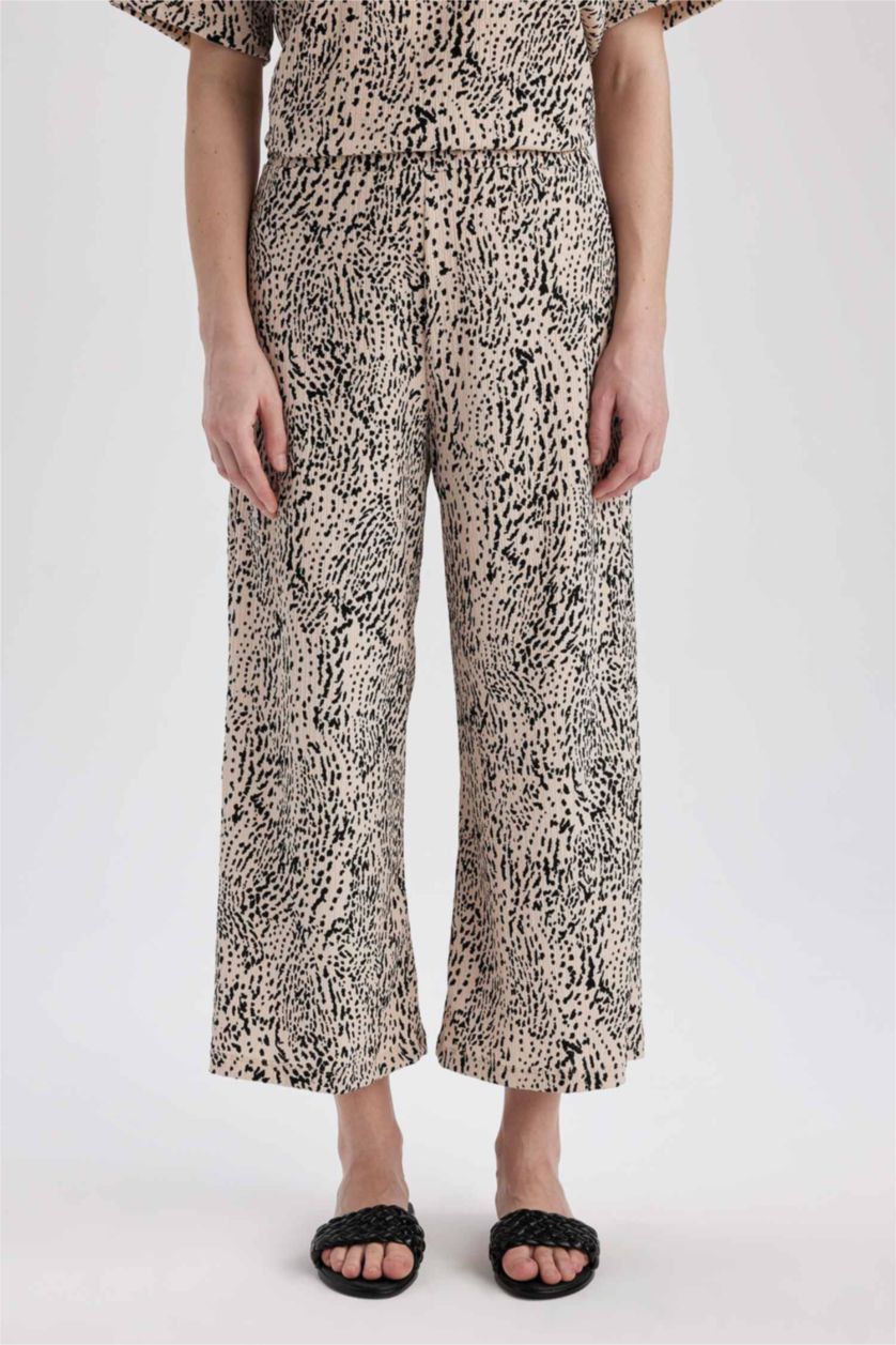 نساء بيج سروال جلد النمر قصة عادية