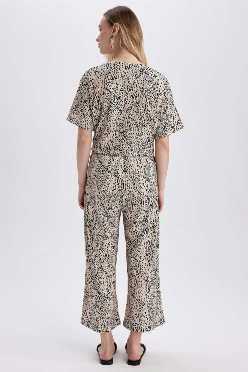 نساء بيج سروال جلد النمر قصة عادية